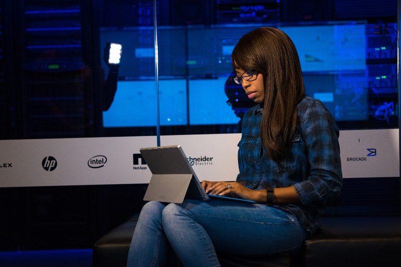 IT-worker-looking-at-her-laptop